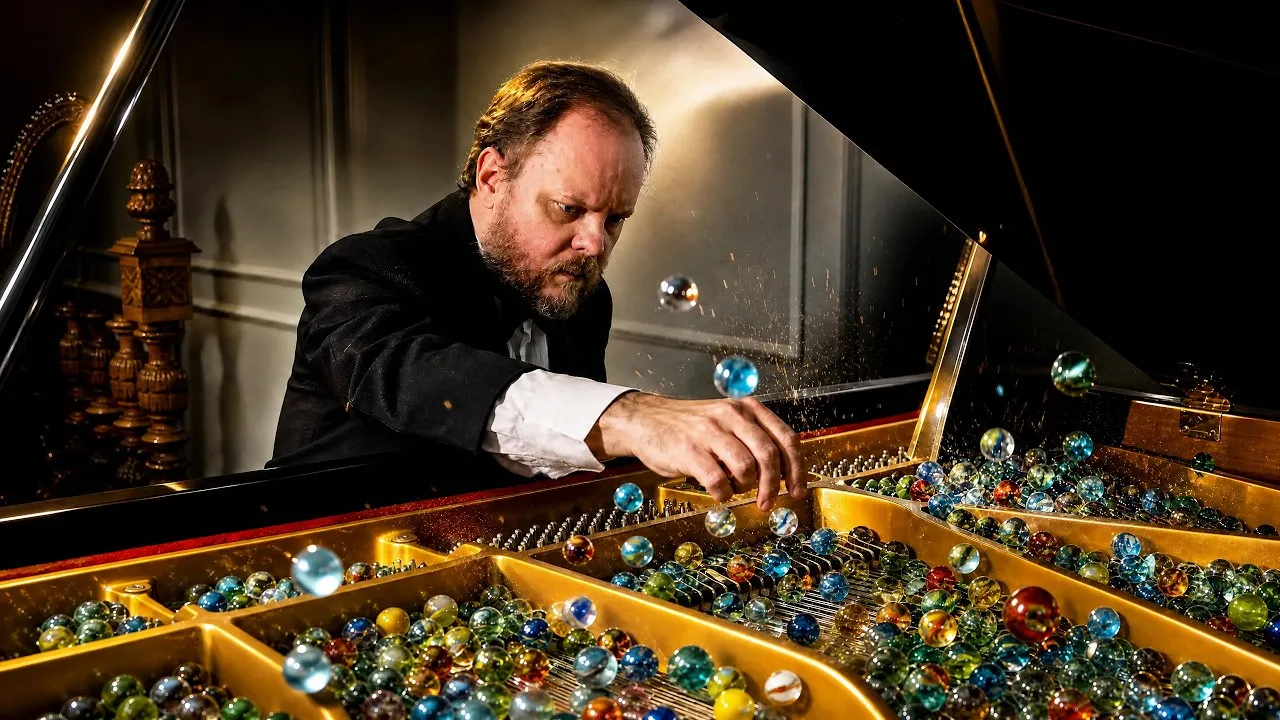 Marbles on Piano Strings